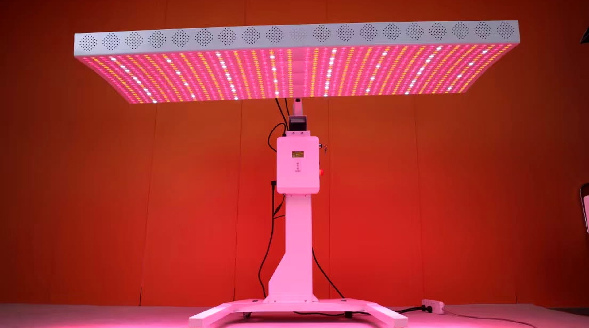Helix Light 9-wavelength red light therapy bed illuminated and ready for a session